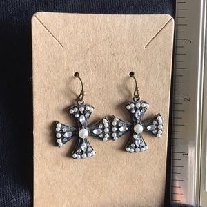 Cross pierced earrings.